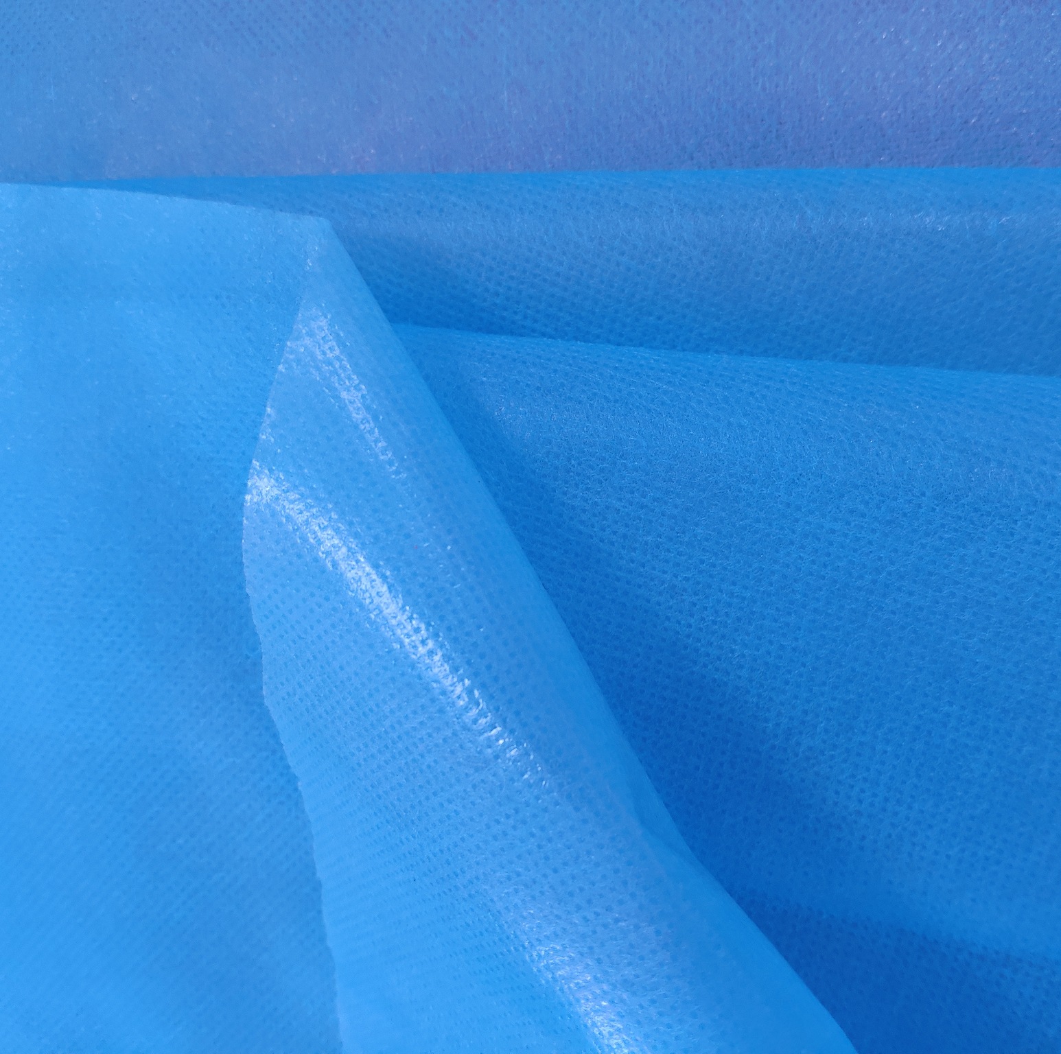 Laminated spunbonded non-woven waterproof disposable non-woven clothing materail